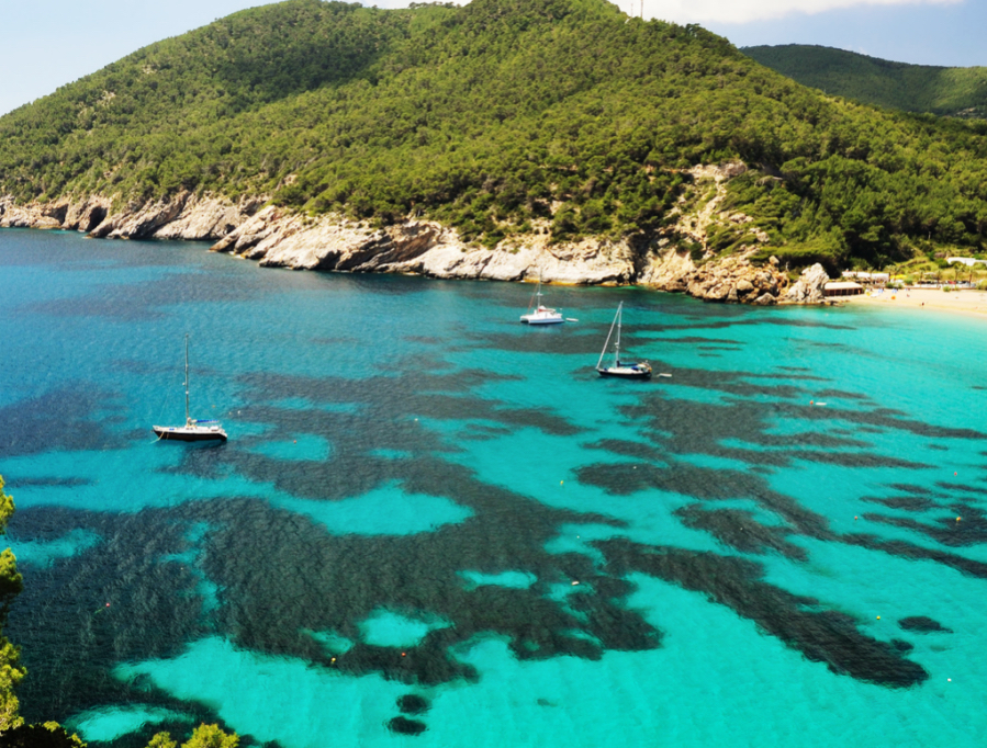 view from the norther end of cala de sant vicent anchorage on ibiza