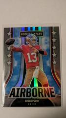 Brock Purdy #AI-28 Football Cards 2023 Panini Rookies & Stars Airborne Silver Prices