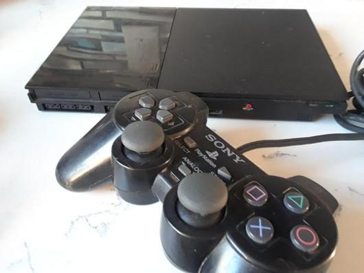 Slim Playstation 2 System photo