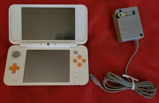 New Nintendo 2DS XL White & Orange photo