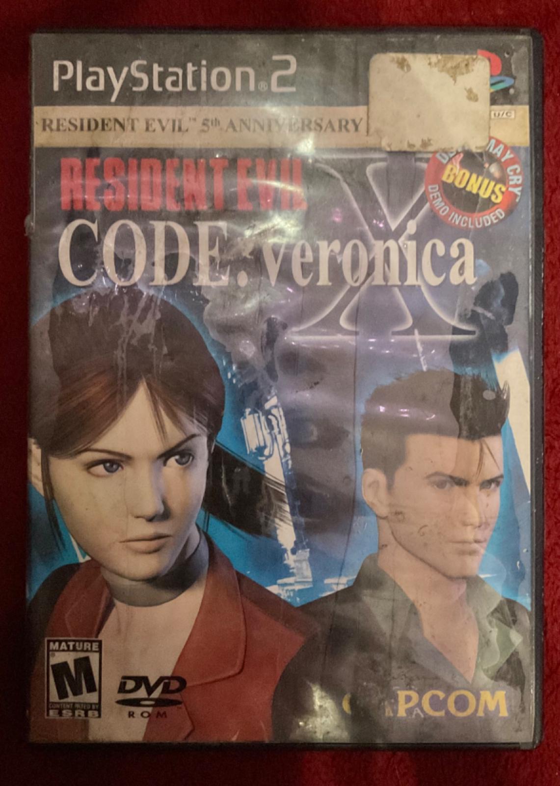 1/3 Resident Evil Code: Veronica X [+ DMC Demo]
  I got this at GameXChange for like, $15 probably. Too much probably, but I was excited sso. UM banyways U can clearly see how beat this thing is. No SEVERE damage (not cracked up or anything) but there's lots of water damage on the outside & inside. Games both work tho luckily