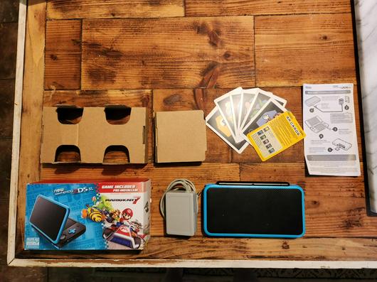 New Nintendo 2DS XL Black + Turquoise [Mario Kart 7 Pre-Installed] photo