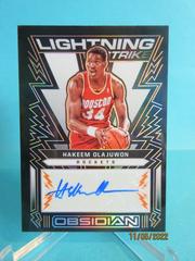 Hakeem Olajuwon [Orange] #LSS-HKO Basketball Cards 2021 Panini Obsidian Lightning Strike Signatures Prices