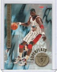 Hakeem Olajuwon #4 Basketball Cards 1996 Hoops Superfeats Prices
