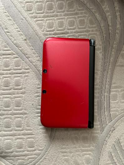 Nintendo 3DS XL Black & Red photo