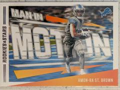 Amon-Ra St Brown #MM-1 Football Cards 2023 Panini Rookies & Stars Man In Motion Prices