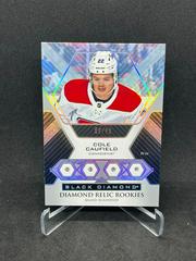Cole Caufield [Quad] Hockey Cards 2021 Upper Deck Black Diamond Rookie Relic Prices