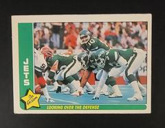 Jets [Looking Over the Defense] #60 Football Cards 1985 Fleer Team Action Prices