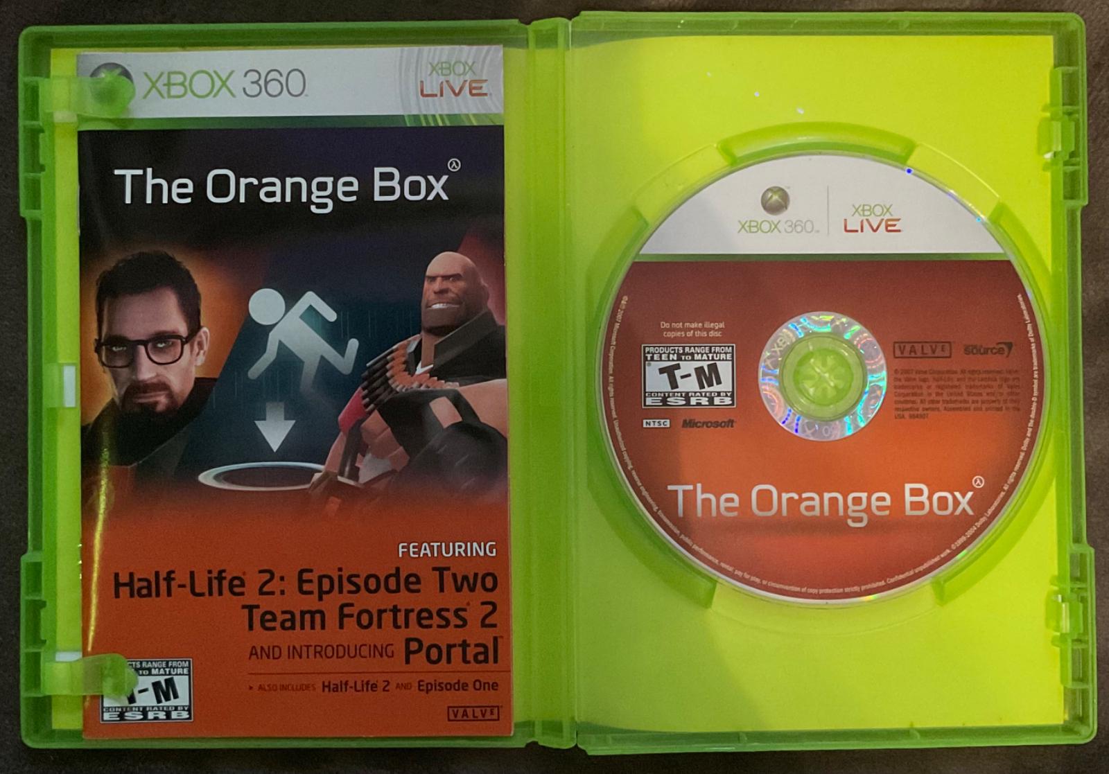 2/2 The Orange Box
    u can't even tell the disc was rattling around in a busted up nasty case,,waaaw