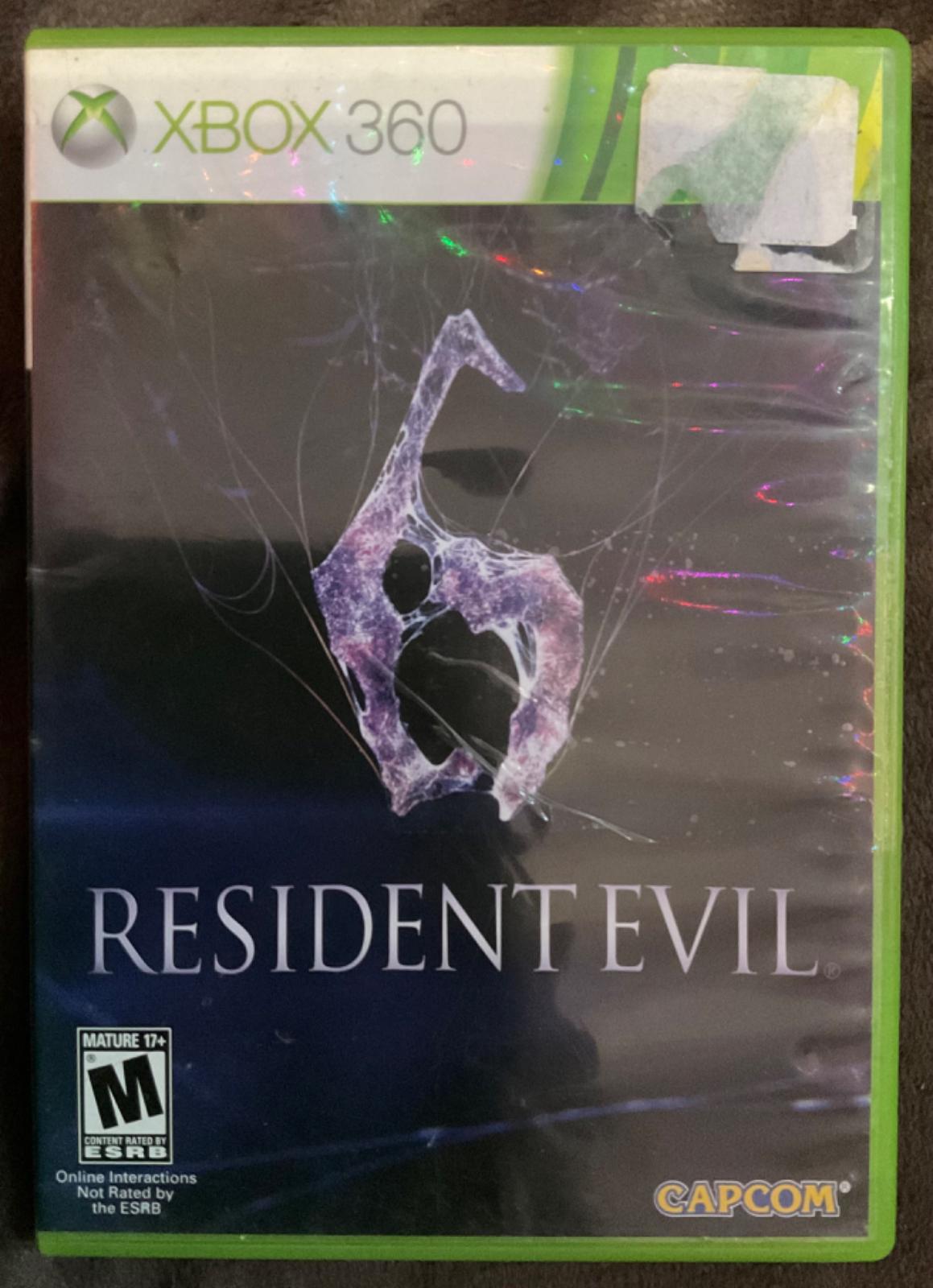 1/3 Resident Evil 6
  omg im being honest I can't remember if the cover on this is printed out or not. I printed a cover lazily for RE5 becos the 2nd and charles one is just so ugly But like I dont think this one is printed out. But what if i am tweaking. What if i am Wrong. Help.