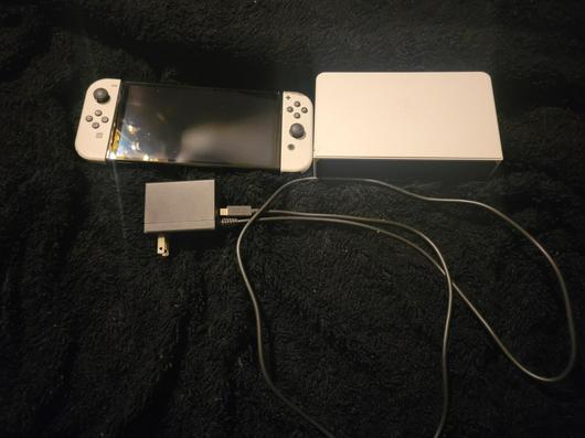 Nintendo Switch OLED with White Joy-Con photo