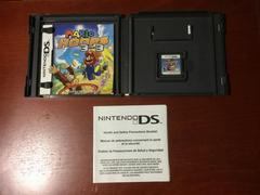Inside Box With Instruction Manuals And Game | Mario Hoops 3 on 3 Nintendo DS