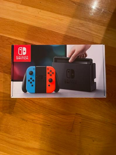 Nintendo Switch with Blue and Red Joy-con photo