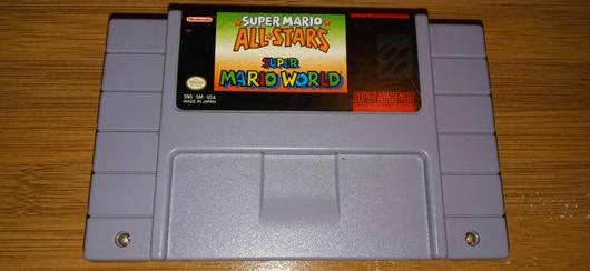 Super Mario All-stars and Super Mario World photo