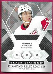 Moritz Seider [Triple] Hockey Cards 2021 Upper Deck Black Diamond Rookie Relic Prices