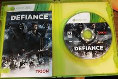 Inside, Manual And Disk | Defiance Xbox 360