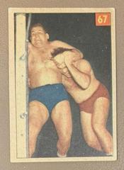 Ernie Dusek [Lucky Premium Back] #67 Wrestling Cards 1954 Parkhurst Prices