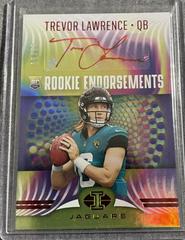 Trevor Lawrence [Red] Football Cards 2021 Panini Illusions Rookie Endorsements Autographs Prices