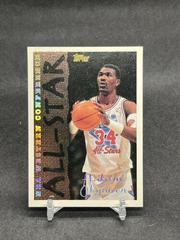 Hakeem Olajuwon [Spectralight] #187 Basketball Cards 1994 Topps Prices