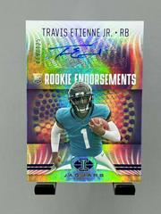 Travis Etienne Jr. Football Cards 2021 Panini Illusions Rookie Endorsements Autographs Prices