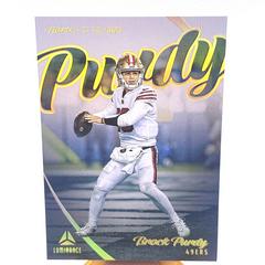 Brock Purdy #NG-8 Football Cards 2023 Panini Luminance Names of the Game Prices