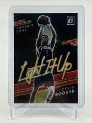 Devin Booker [Red] Basketball Cards 2021 Panini Donruss Optic Light It Up Prices