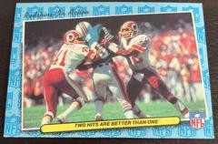Redskins in Action [Two Hits Are Better Than One] Football Cards 1986 Fleer Team Action Prices