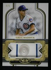 Greg Maddux #T1UB-GM Baseball Cards 2023 Topps Tier One Uniform Button Relics Prices