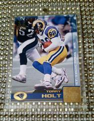Torry Holt [Gold] Football Cards 2000 Pacific Omega Prices