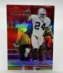 Charles Woodson [Spectrum Red] #140 Football Cards 2000 Playoff Prestige Prices