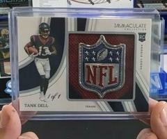 Tank Dell #35 Football Cards 2023 Panini Immaculate Rookie Shield Prices