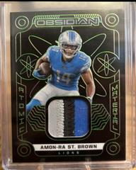 Amon Ra St. Brown [Green] #AM-AST Football Cards 2022 Panini Obsidian Atomic Material Prices