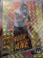 Travis Etienne Jr. [Yellow Reactive] #1 Football Cards 2023 Panini Mosaic Thunder Lane Prices