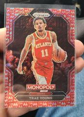 Trae Young [Red Shimmer] #1 Basketball Cards 2022 Panini Prizm Monopoly Prices