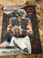 Justin Fields [Ruby] #1 Football Cards 2023 Panini Black Prices