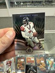 Michael Vick [Black] #4 Football Cards 2005 Upper Deck Reflections Prices