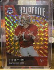 Steve Young [Reactive Yellow] #11 Football Cards 2021 Panini Mosaic HoloFame Prices