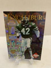 Ronnie Lott [Gold Shield Silver Prism] #17 Football Cards 1995 Collector's Edge Excalibur 22K Prices