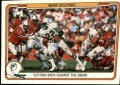 Miami Dolphins [Cutting Back Against...] #27 Football Cards 1982 Fleer Team Action Prices